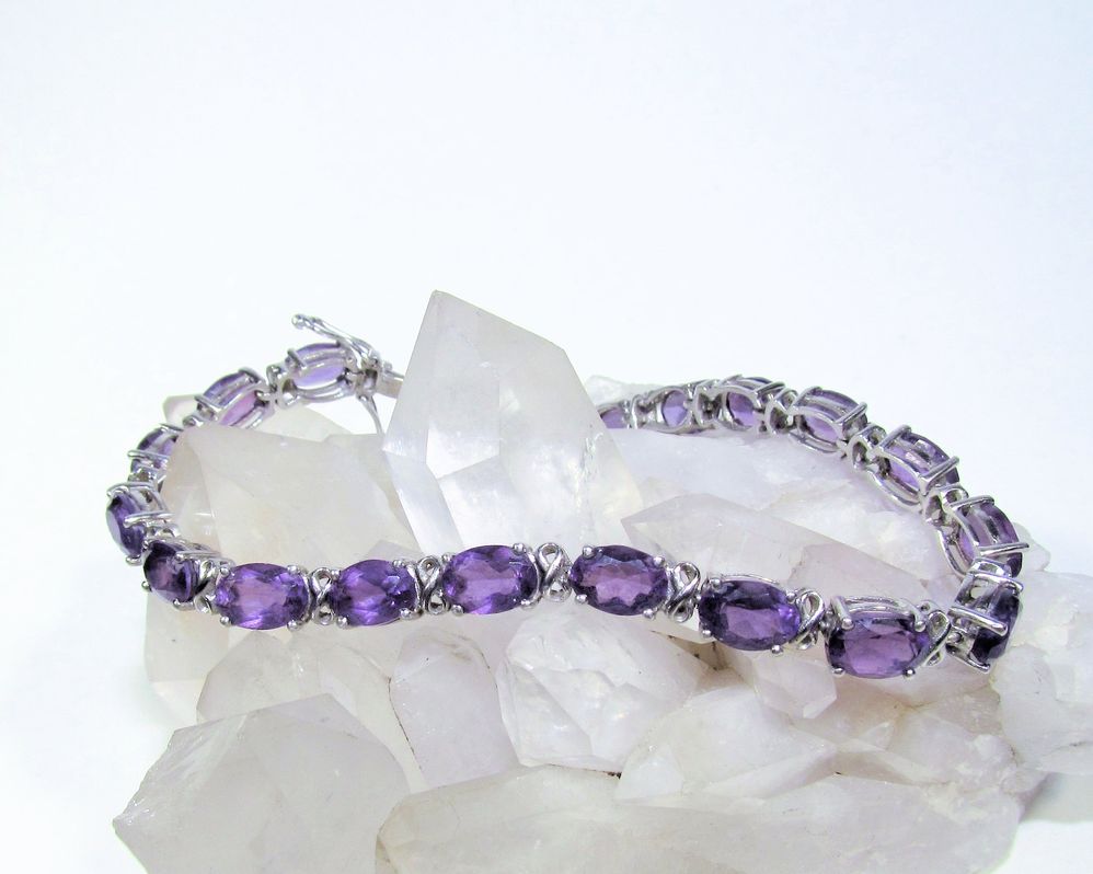15 CTW amethyst and sterling silver tennis bracelet.