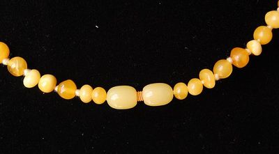 egg yolk amber necklace clasp.jpg