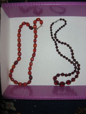 Facetted necklaces, the one on the left amber, the other one is Bakelite