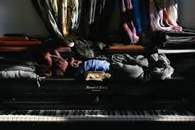 clothes on piano.jpg