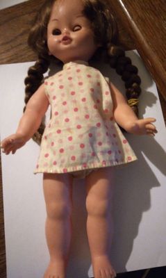 front of doll