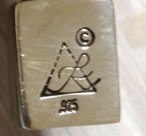 logo on back of clasp