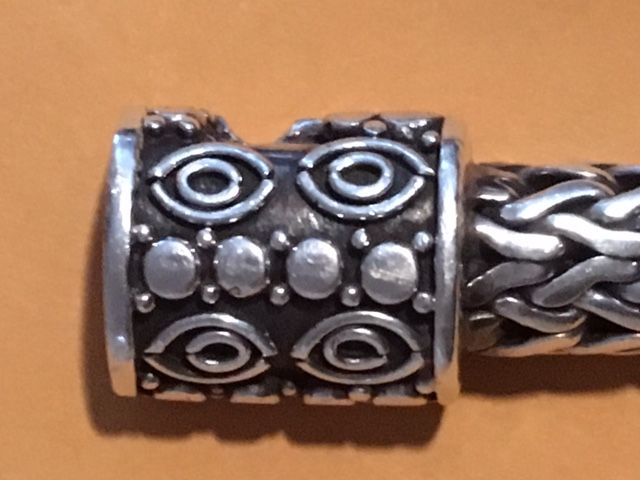 front of clasp
