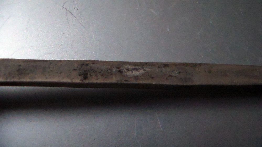 mark but it is very worn handle is 6 inches and quite thick