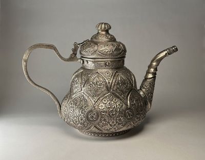 silver repousse teapot 1b copy.jpg