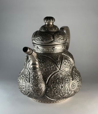 silver repousse teapot 2 copy.jpg